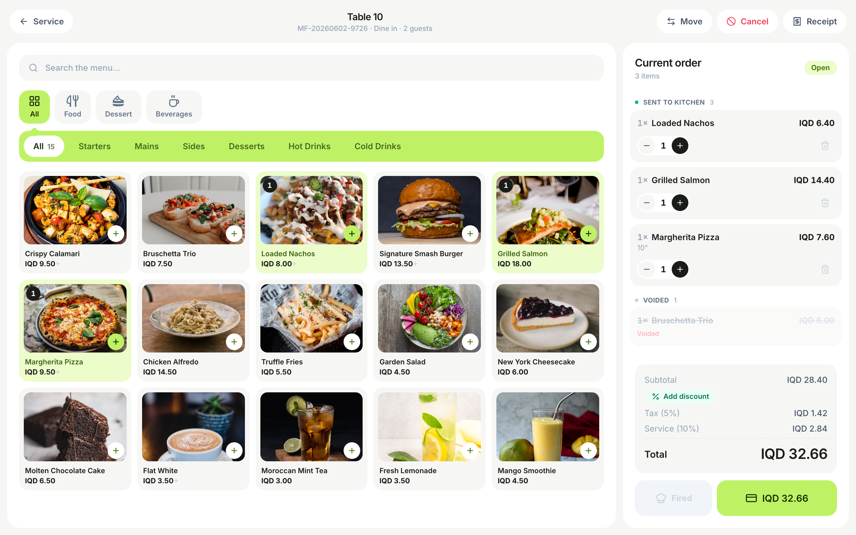 The POS order builder with the menu grid on the left and the running check on the right.